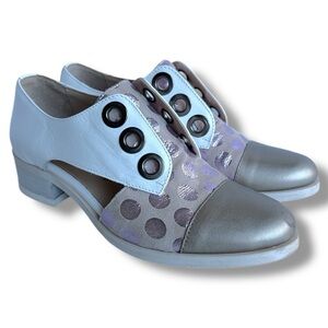 Unity in Diversity White and Gold Loafers with Unique Side Cut-Out Design